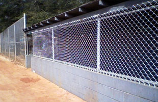 Gray wall with chain fence